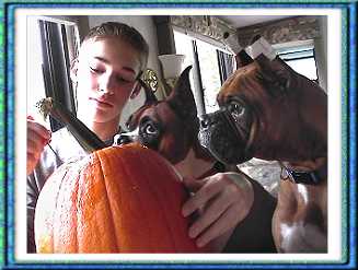Bella and Spencer helping to carve pumpkins :-))